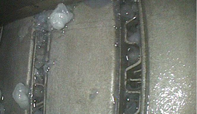 Tukkeutunut taajuusmuuttajan jäähdytysmoduli.